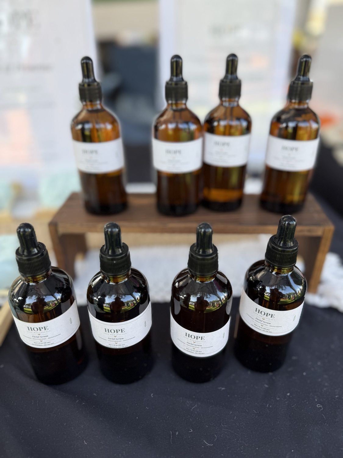 HOPE Life Botanicals facial serum in amber glass bottles with droppers